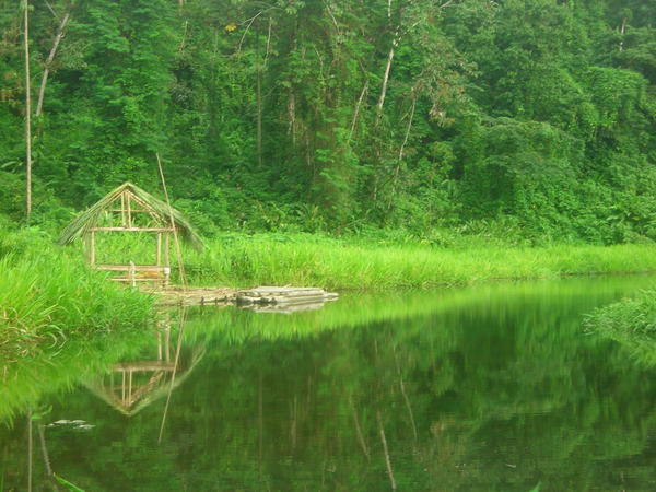 Wooden Hut on Lake.