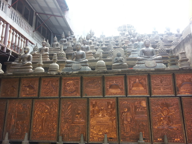 Rows of Buddha's and bronze carvings