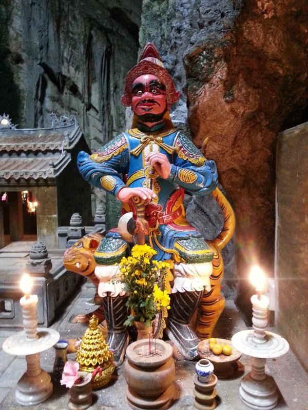 Guarding Huyen Khong Buddhist grotto 