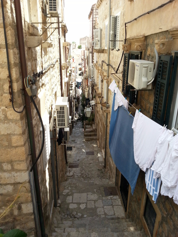 Tiny streets....got to love the washing lines!