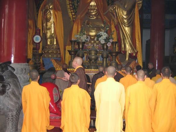 Shoalin monks praying in the temple