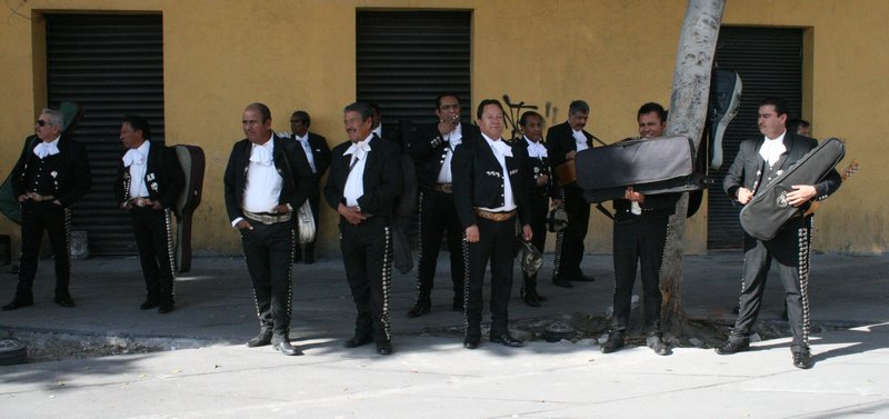 Mariachis work the street