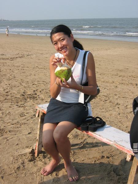 Melenie eating a coconut