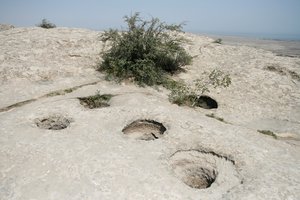 Qobustan petroglpyhs - holes made by cave men to store water