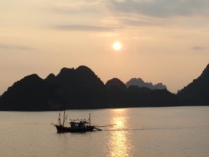 sunset fishing in Ha Long Bay