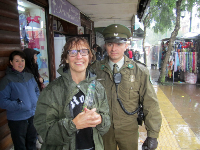 It's wet out there today -- But still time for a photo with a cop!
