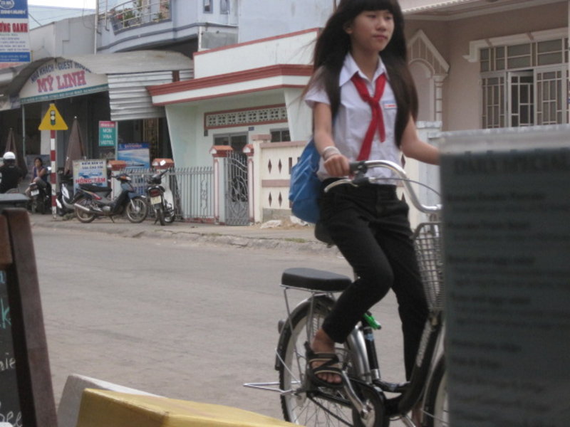 Schoolgirl with extra seat on the back