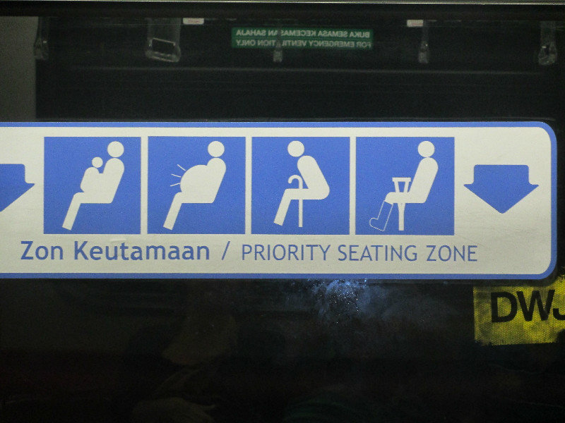 Sign on underground - pregnant looks fun!