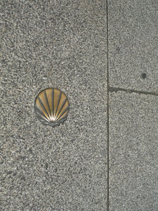 The Pilgrims way - marked by the scallop symbol for St James