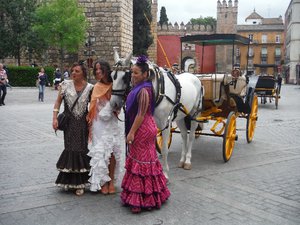 Flamenco dresses, heading to Feria Seville
