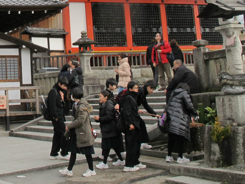 Japanese schoolchildren near a temple