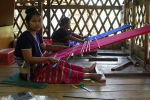 Women from the Karen Hill tribe weaving