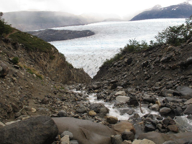 The creek that cascades into the glacier