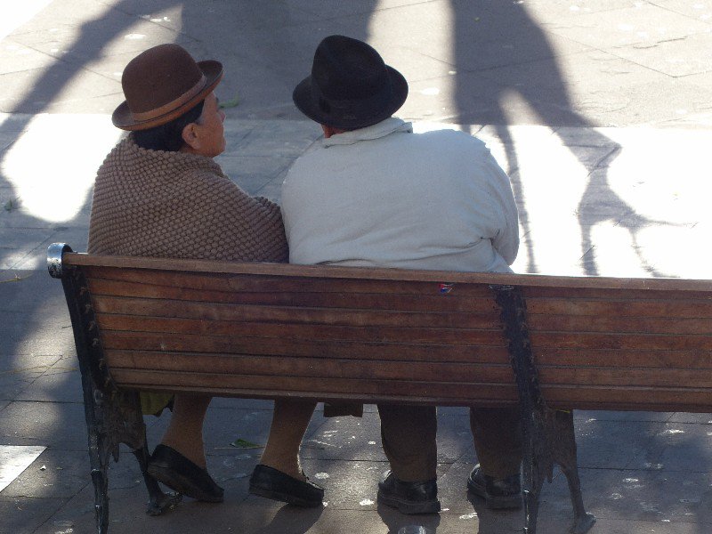 Bolivian couple hanging out in the square