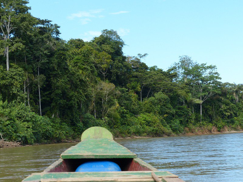 Cruising down the Rio Tuichi in a dugout canoe
