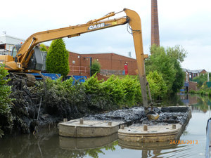 Emptying the silt from the dredging barges.