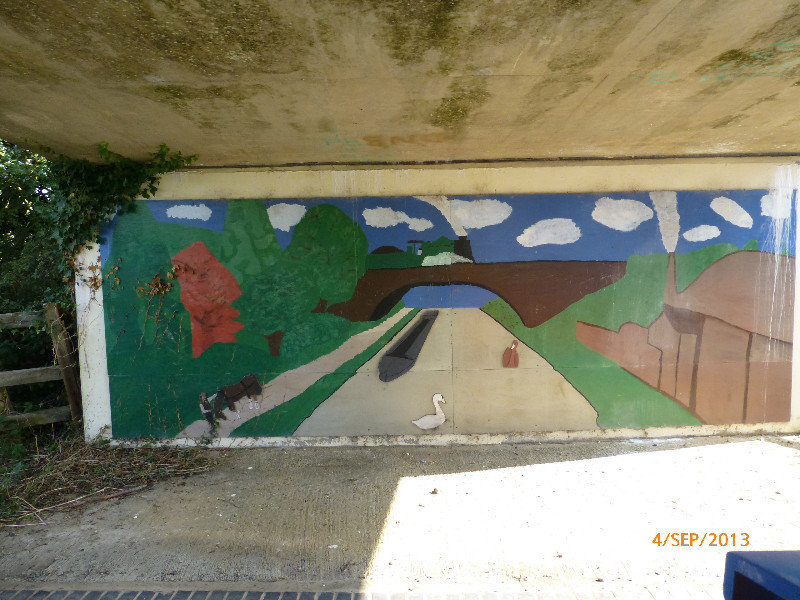 One of the murals underneath a bridge.