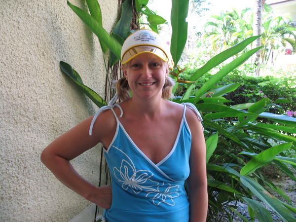 Sporting such a fashionable item..this year's sun visor model available in yellow or blue...go girl !