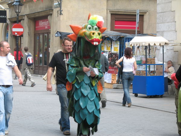 Krakow dragon handing out leaflets