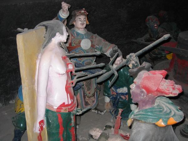 Statues Depicting Torture at The Temple Of Hell, Ghost City