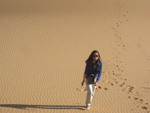 Becky going up a dune