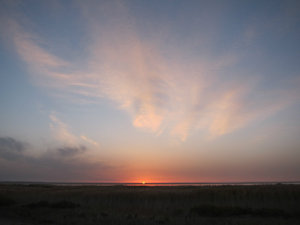 Sunrise over a large near Ejina Qi