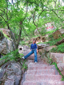 Becky climbing Qing Yuan Shan