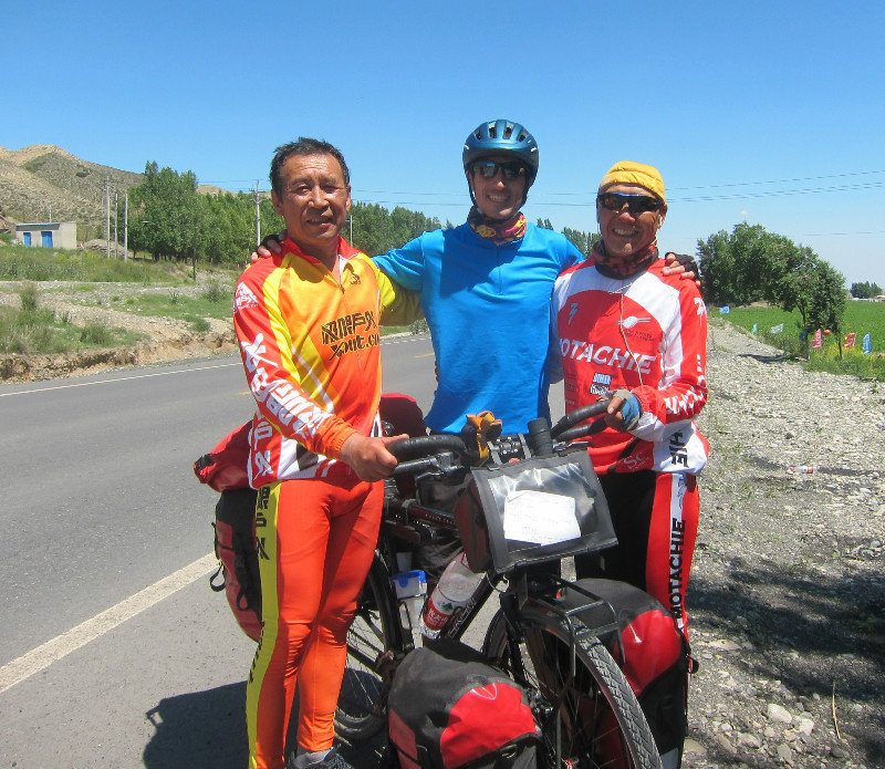 after a few hours of riding I met these gentlemen from Urumuqi