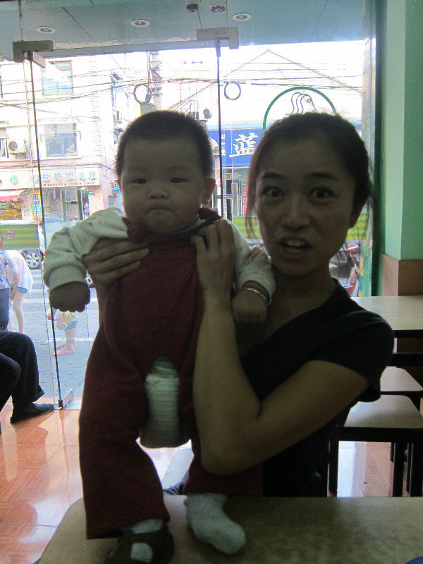 In a restaurant in Shanghai. Babies love Becky