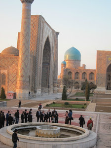 wedding guests dancing in front of the Registan