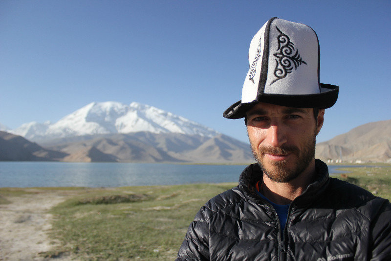 At lake Karakul with a Kyrgyz hat