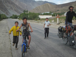 Carlos followed by local kids in the Pamir