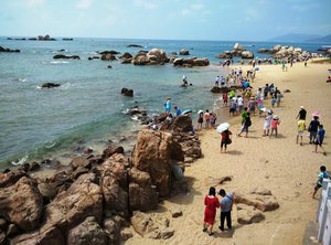 Tianyahaijiao is famous in China. It's a romantic place where couples get married