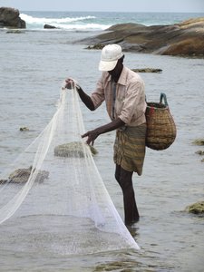 fisherman at Passekudah