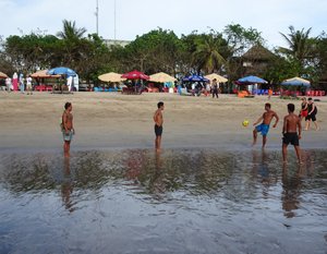 a game of football on Kuta Beach