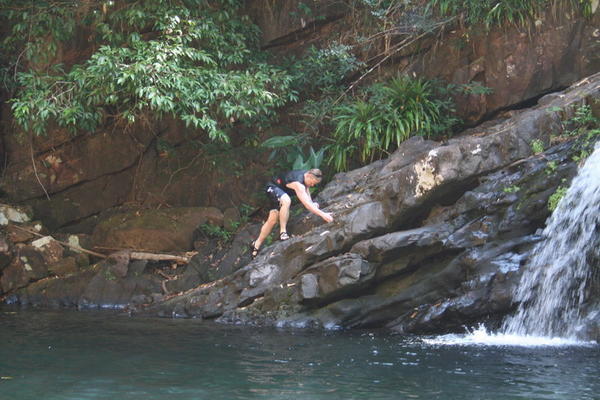 Nate playing at the waterfall Lu Du