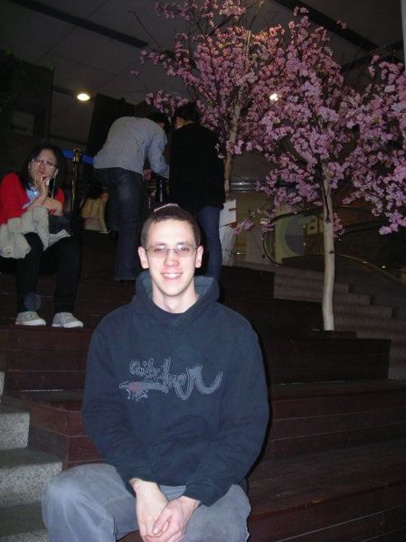John in the fake cherry blossoms in the subway!