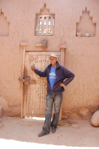 Muhammed proudly showing us his home in the Kasbah