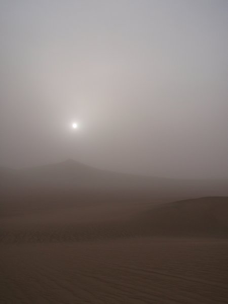 Sand storm coming in blocking out the sun