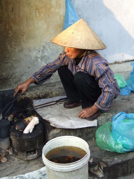 Frying some pork legs, Hanoi