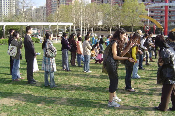 Random Chinese people watching the Egg Toss