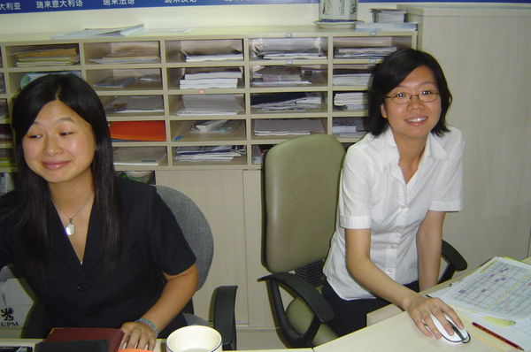 Two Chinese staff members, Echo and Amanda