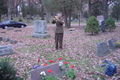My father, dressed in his father's World War II uniform, playing Taps to honor Grandpa's memory 