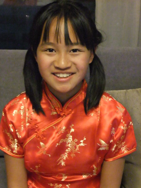Ya-Li Wearing Her New Qipao in Honor of New Year's Eve