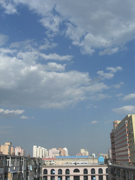 We do, indeed, have blue sky and puffy white clouds in China 
