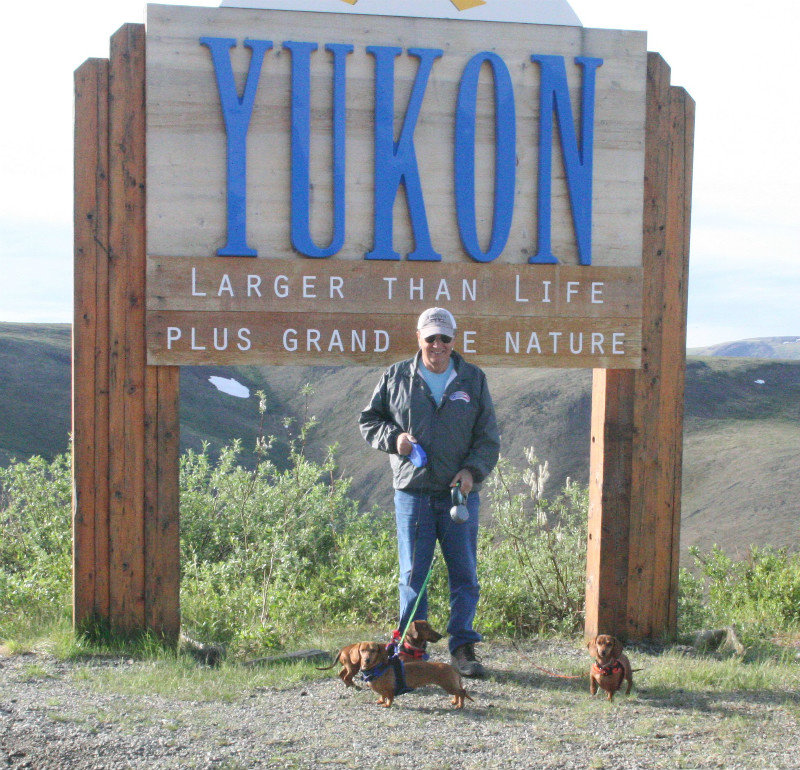 Joe & dogs say goodbye Yukon
