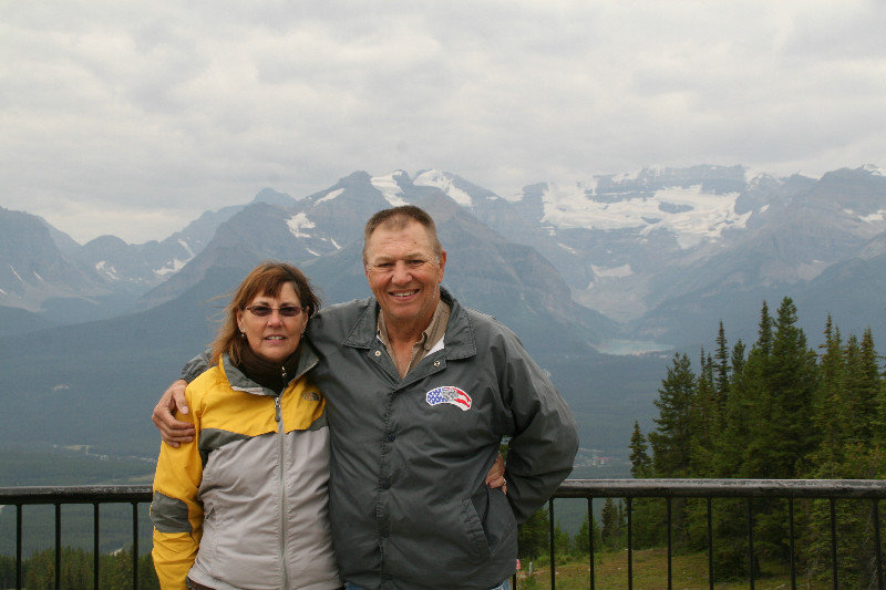 Good looking couple at the top of the mountain -Lake Louise on right