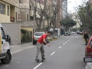 Arturo doing his skateboard moves