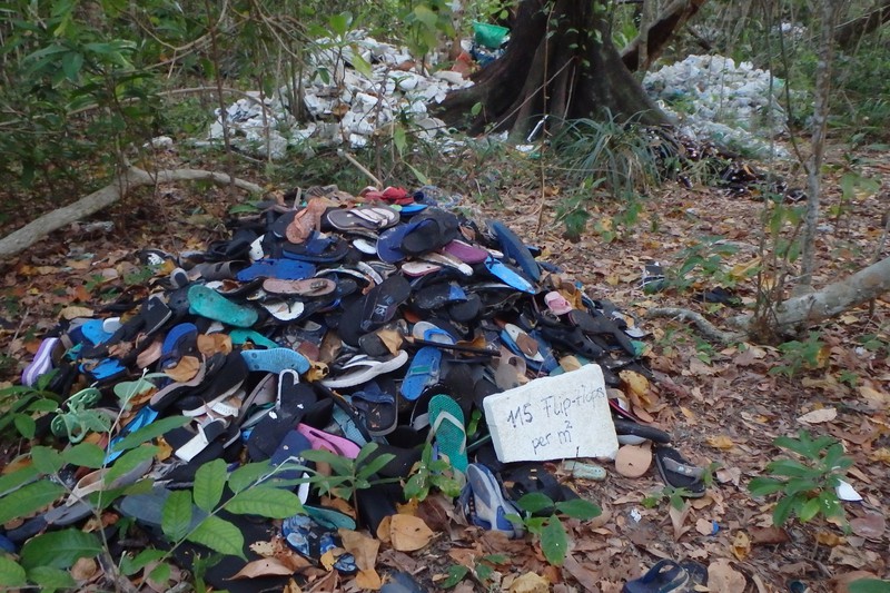 pile of collected thongs (flip-flops)