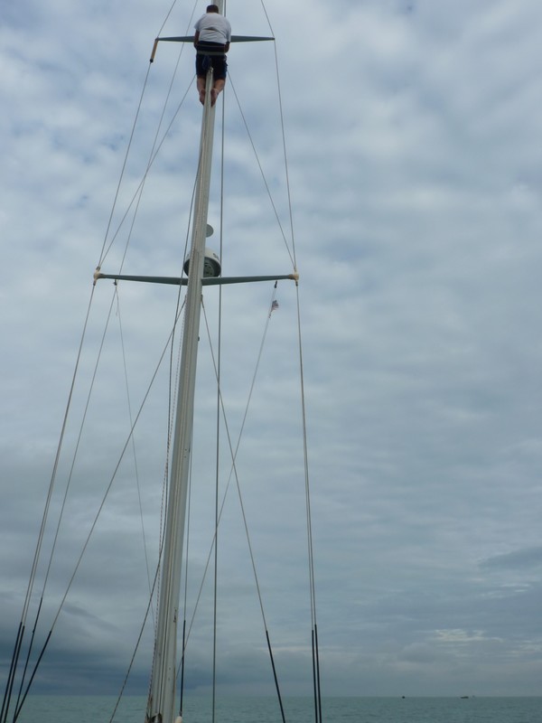 Jerry happily climbs the mast underway